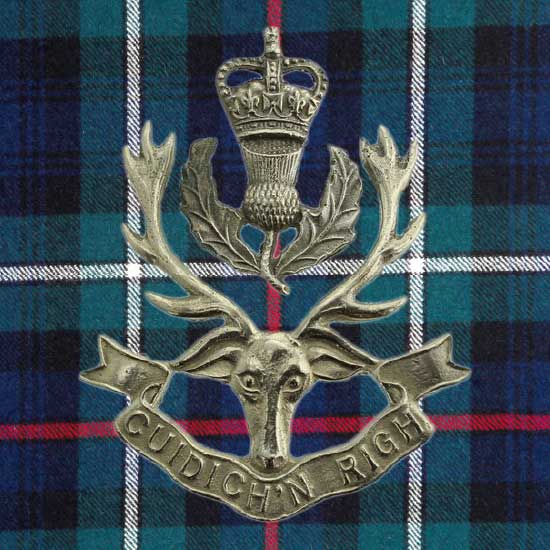 The Queen’s Own Highlanders (Seaforth and Camerons) Cap Badge and Tartan