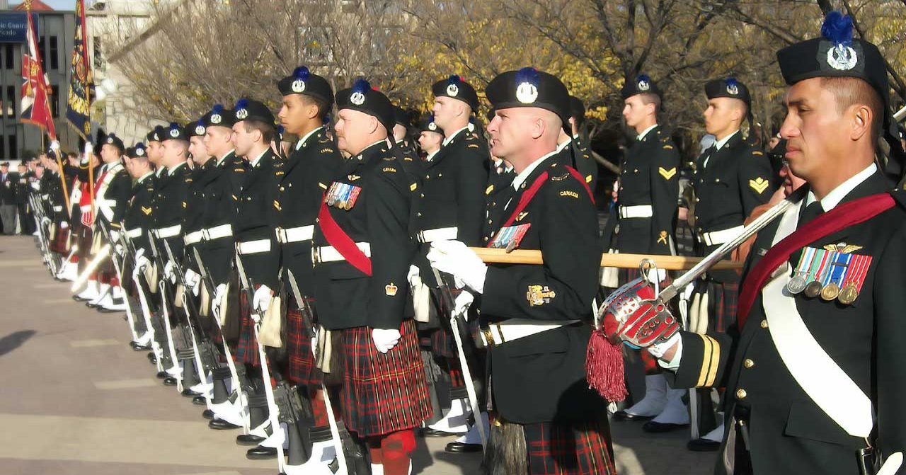 cropped-camerons-in-dress-uniform-standing-attention-small
